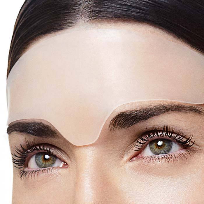 Closeup of a model wearing forehead wrinkle patches