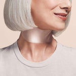 Model wearing SiO NeckLift patches