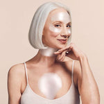 Model wearing SiO Wrinkle Rescue Pack patches